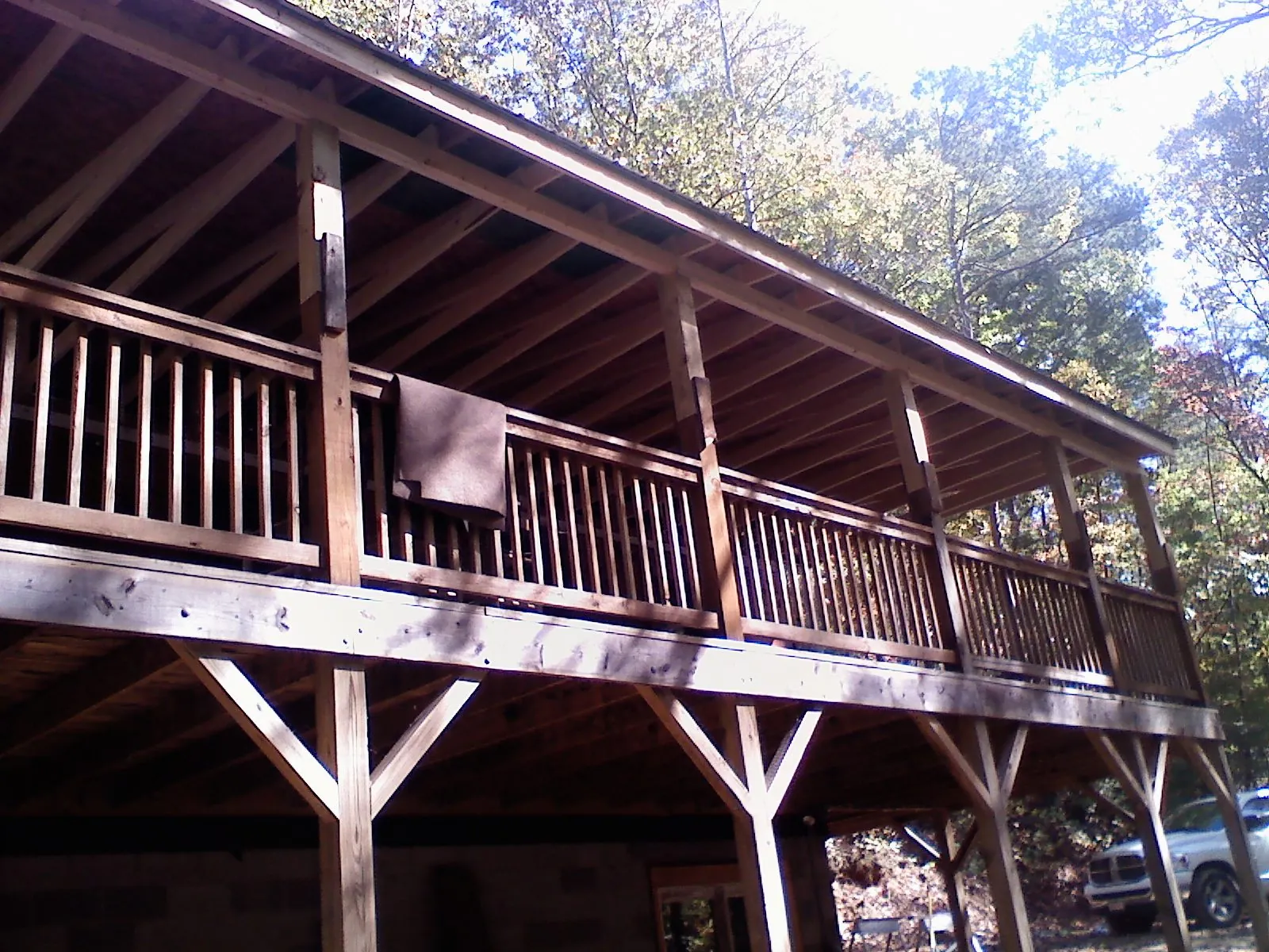 Timber framing under a new elevated porch and deck — Roof Leak Repair in Snover by Roofing Brothers